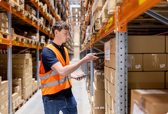 Warehouse worker scans item